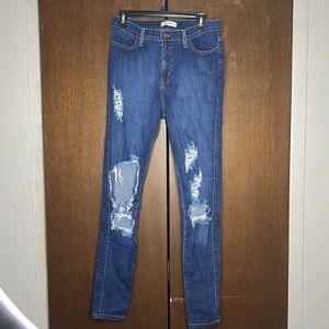 High waisted cut out jeans